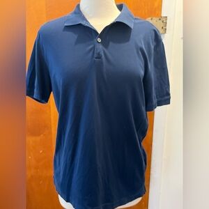 Banana Republic men’s Deep Blue Short Sleeve Polo Shirt
. Size L. Luxury touch